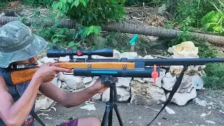 sniper marble gun [[hit the can over 70ft