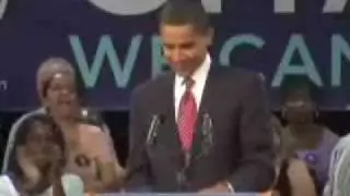 OBAMA BRUSHIN HIS SHOULDERS