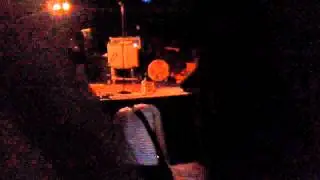 Lead Singer Of The Transistors Playing Guitar in The Crowd