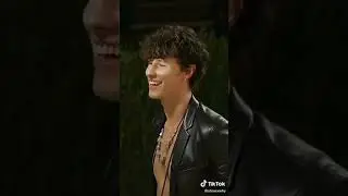 Can you take to look at Shawn showing his abs.