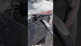 Charging your Tesla in the snow and watching Netflix! #teslacharger #teslacharging #teslabattery