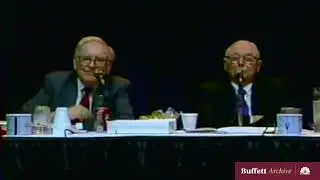 Essays of Warren Buffett by Larry Cuningham