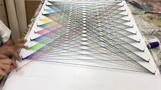 Making of colourful geometric art with colourful strings