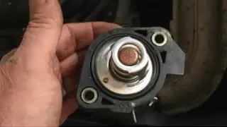 Replace the thermostat on a Dodge Grand Caravan