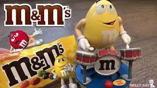 Музыкант Желтый M&M’s Обзор на игрушку БАРАБАНЩИК M&M Yellow drum man TOY