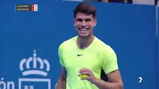 What did the woman say to Alcaraz that made him Smile