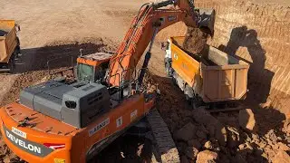 Develon Excavator Works on Hard Ground