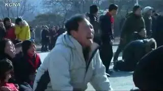 Koreans Crying over Death - Benny Hill Style (Kim Jong il)