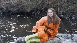 Darina having fun in her wet & muddy orange rainsuit