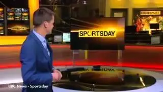 Bizarre moment BBC reporter taps imaginary iPad in his hand