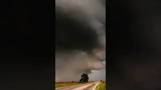 Supercell thunderstorm with some sculpted low level structure moving overhead near Geuda Springs, KS