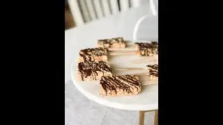 Brown Butter Salted Rice Krispies Treats on a stick