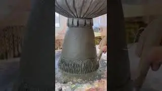 DIY fly agaric with caterpillar and snail made of cement. Garden mushroom figurine. Artbeton