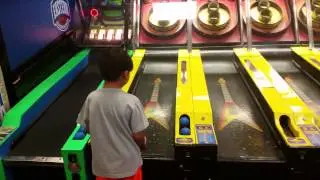 Daniel playing skee-ball part 2 at Chuck e cheese