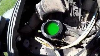 Polaris 4 Wheeler / ATV Learning how to check the oil and coolant levels.