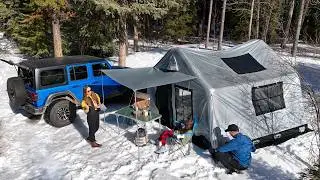 Snow camping in an Inflatable tent with a Wood Stove