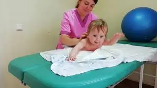 Кроха на массаже