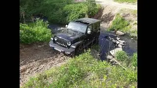 Jeep wrangler and small river