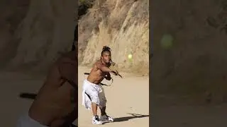 We challenge a Samurai to fight tennis balls