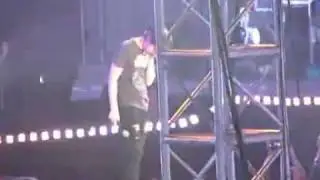 110305 SS3 Shanghai Heechul getting hit by a fanboard.flv