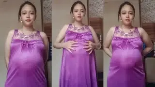 pregnant woman in evening uniform