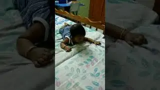 baby lying front side down face and move forward | baby rolling over