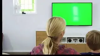 Green screen TV watching family