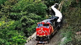 HUGE CPKC & CN FREIGHT TRAINS CURVING THRU THE CANYON W/ SPECIAL LITTLE YARD UNIT!