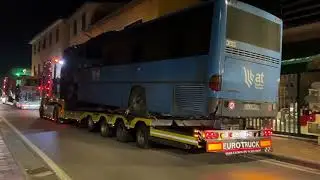 MOVING TWO BURNT BUSES IN BARGA