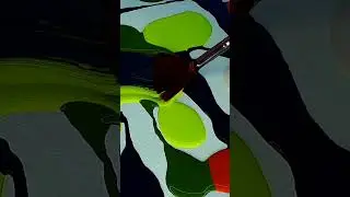 Pouring acrylic paint on small canvas
