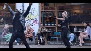 Road man picks up Female Police Officer
