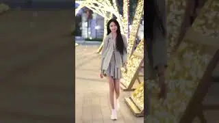 Cute girl walking down the street