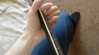 Adjusting the truss rod of an electric guitar