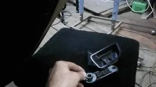 disassembly of the rear door trim panel on Kia Rio