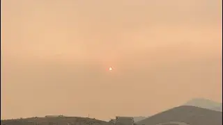Smooky  day in Las Vegas and look at  the moon is red