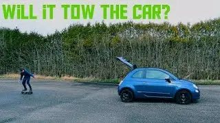 Trying to tow a car with the DIY off-road electric skateboard (AKIO TV)