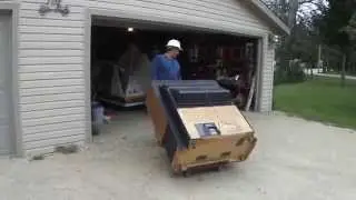 Greg Zanis - Scraping Apart A Big Projection TV