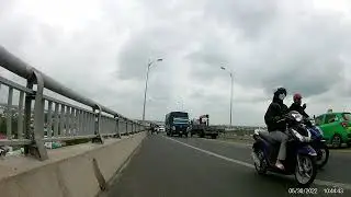 @Cycling across Rach Mieu bridge