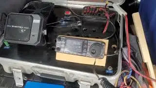 Hunting POTA from the back of the truck, on the Halogen lamp antenna