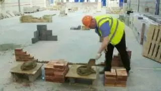 Laying bricks to line