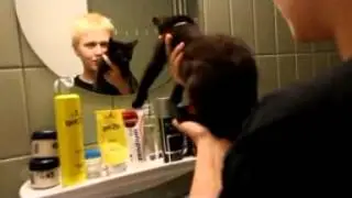 looks in the mirror