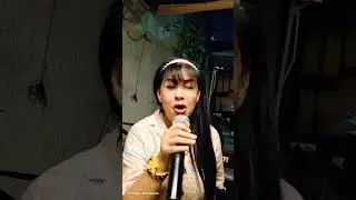 Mae Rivera singing the song 