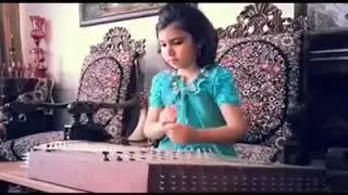 Twelve year old Iranian girl with talent of Santour