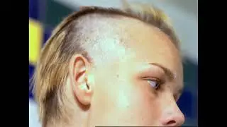 Blonde long haired girl shaves her head smooth in Powerade commercial