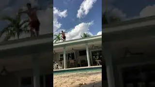 Stupid kid flips off roof into pool