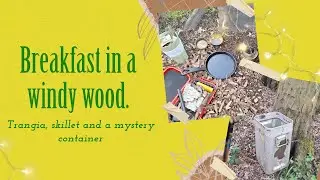 Breakfast in a windy wood, trangia, cast iron skillet and a mystery container.