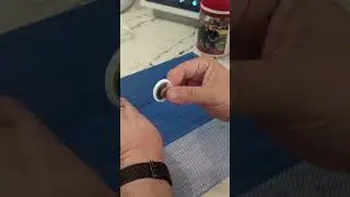 open your Apple AirTag to replace battery...