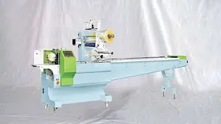 Reciprocating type flow wrapper snack food pillow bags packaging equipment آلة تغليف المواد الغذائية