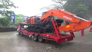 Detik - Detik Truk Selfloader Bermuatan Excavator Tidak Bisa Berbelok di Sitinjau Lauik