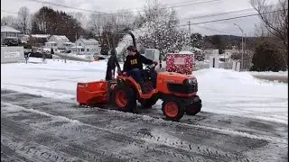 Kubota b7510 snow blowing slush.